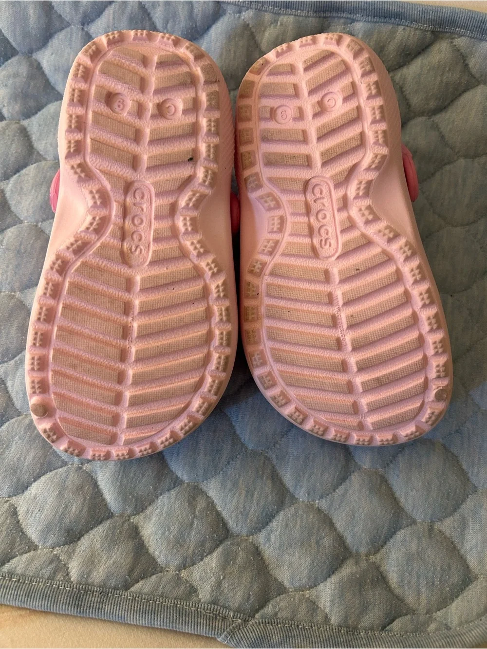 CROCS Kids Pink Clog Slippers with Orange Flower Charm